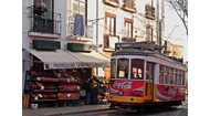 UM ELECTRICO DA CARRIS PASSA DEFRONTE DE UM MINIMERCADO NUM BAIRRO POPULAR DE LISBOA, MALTE JAEGER / LUSA